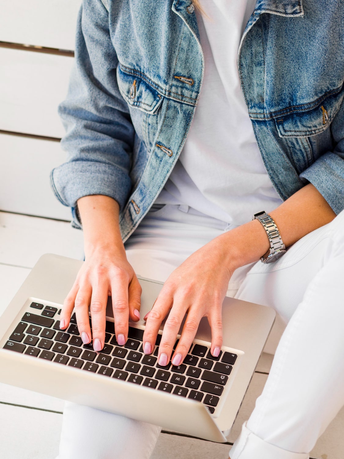 high-angle-woman-working-laptop-min